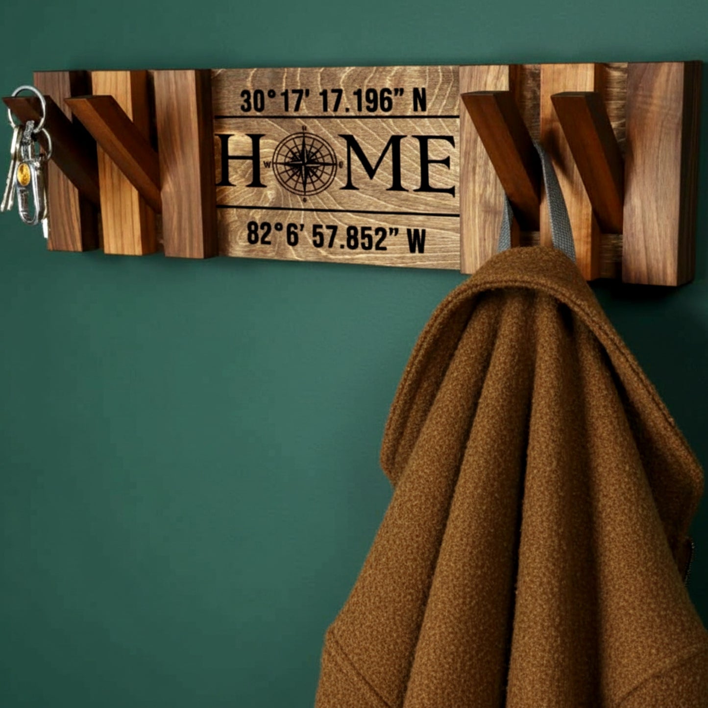 Walnut piano coat rack wall mounted flip down hooks.