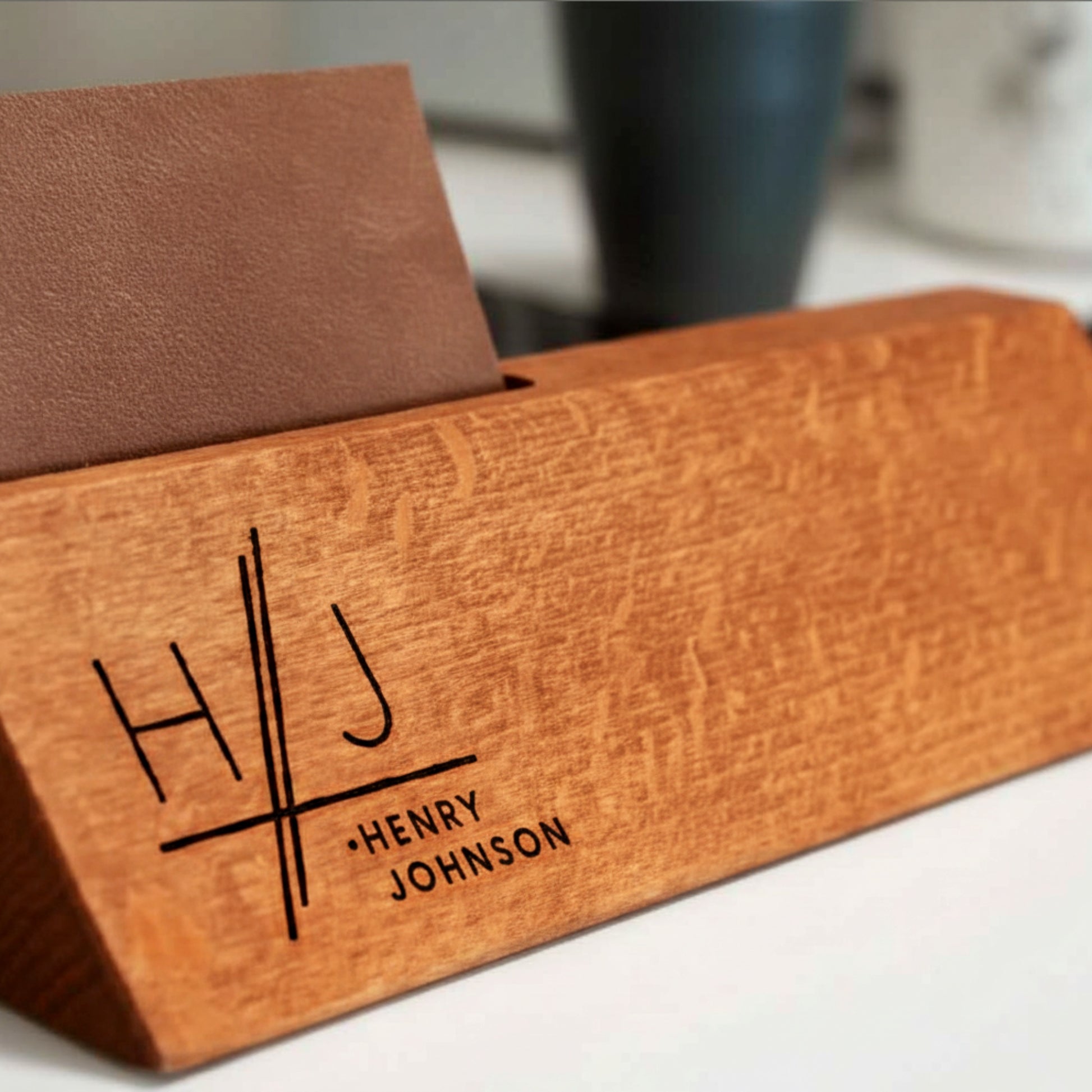 Personalized wooden desk name plate with card holder slot.
