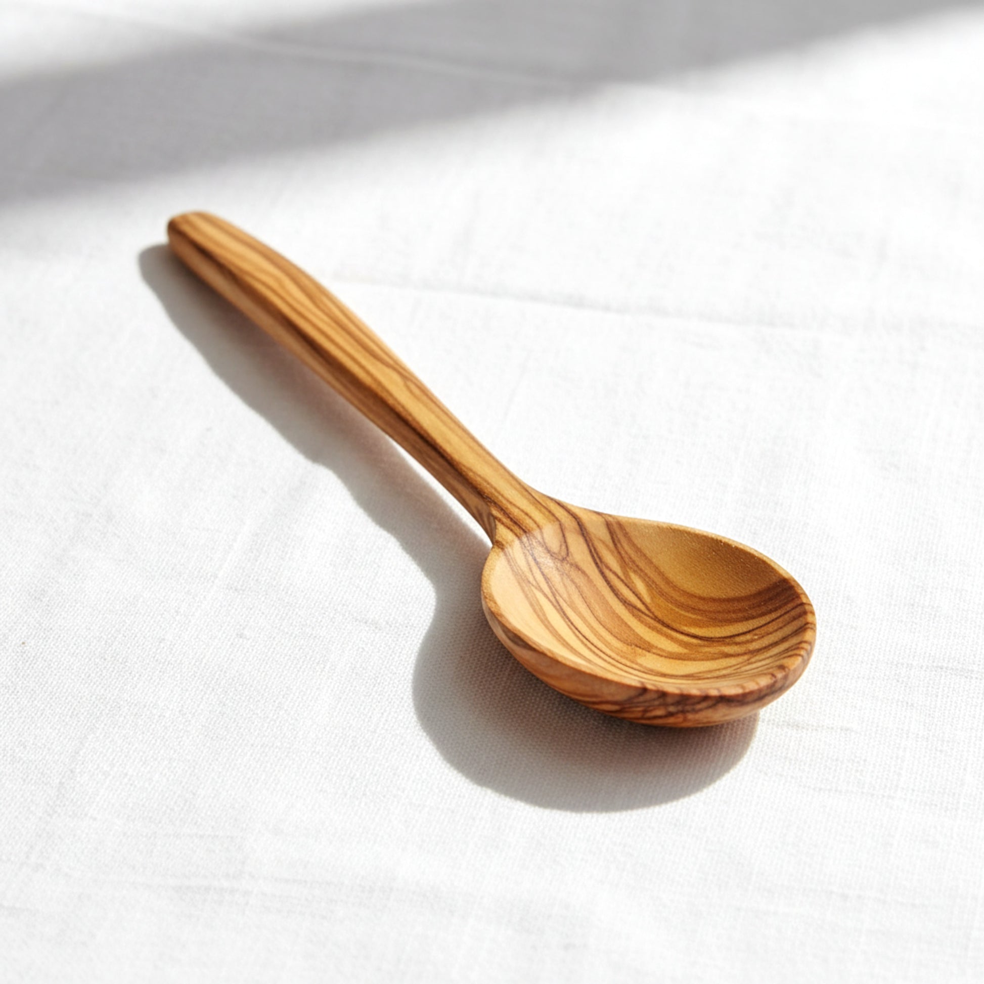 Hand carved olive wood cooking and tasting spoon.