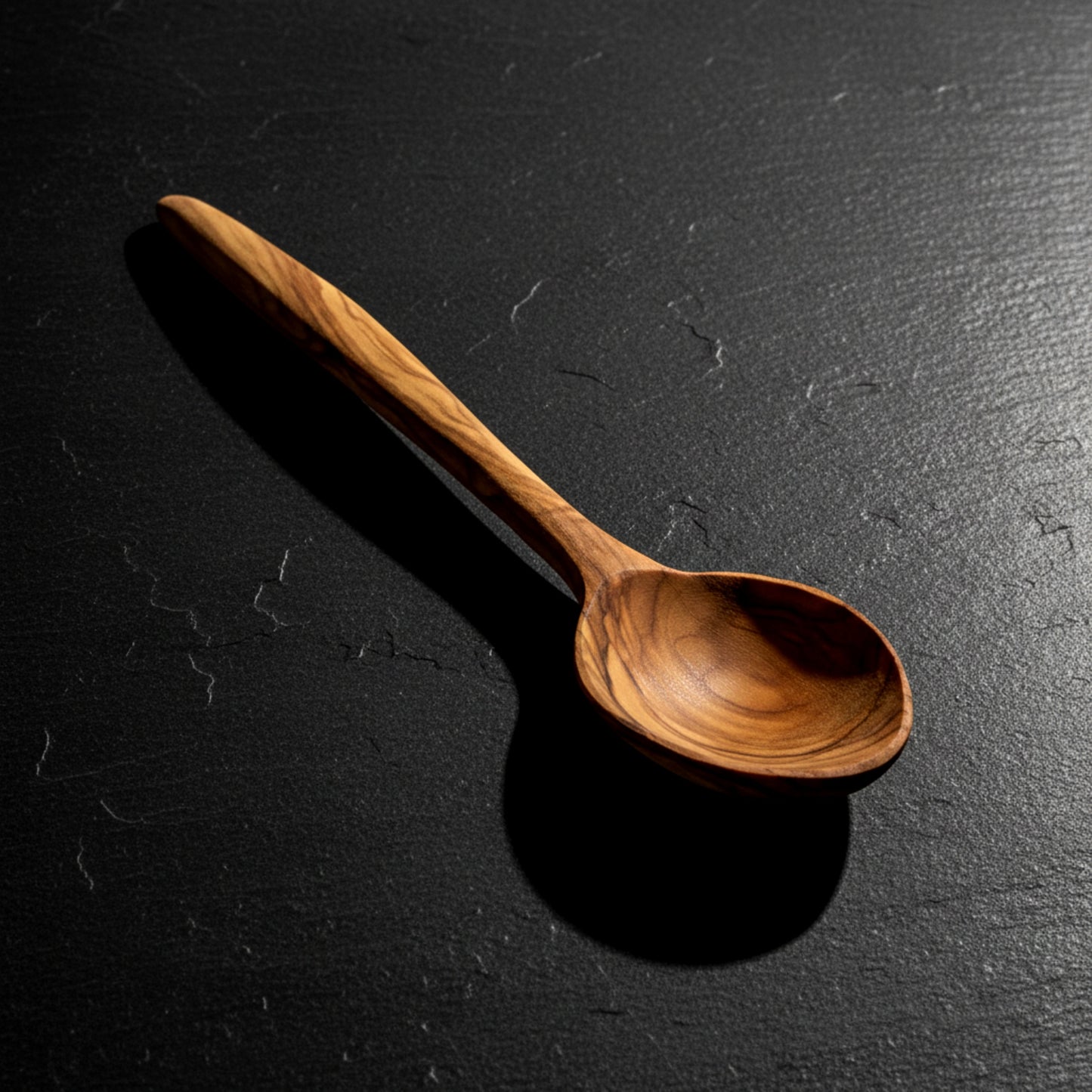 Hand carved olive wood cooking and tasting spoon.
