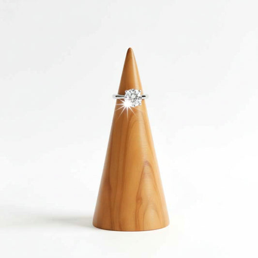 Solid walnut wood ring holder cone for engagement rings.