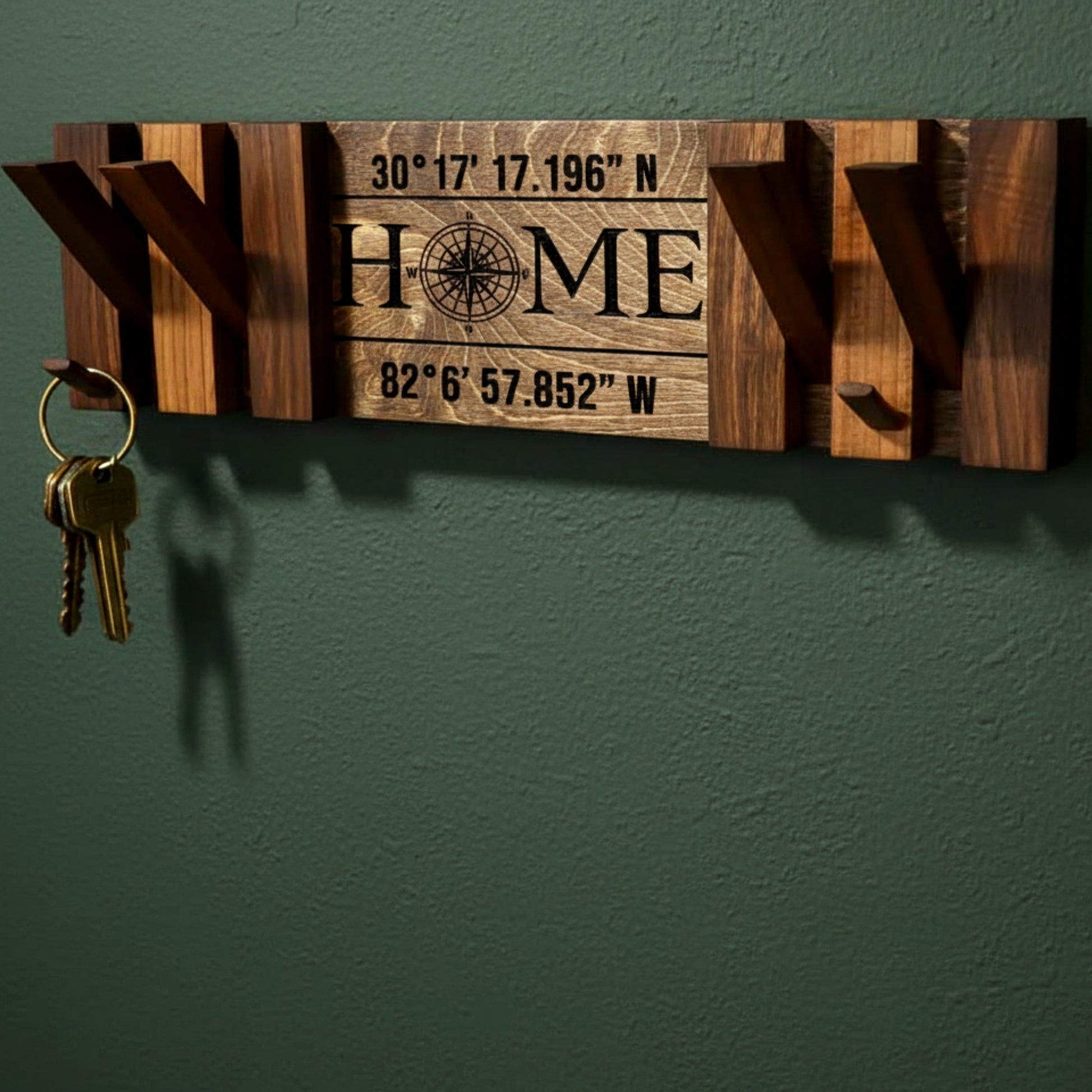 Walnut piano coat rack wall mounted flip down hooks.
