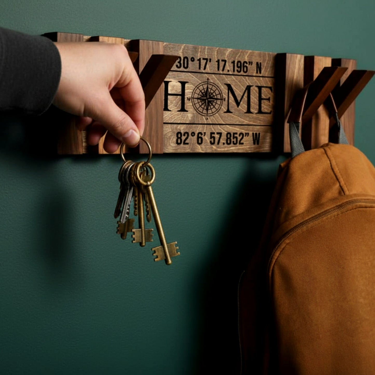 Walnut piano coat rack wall mounted flip down hooks.