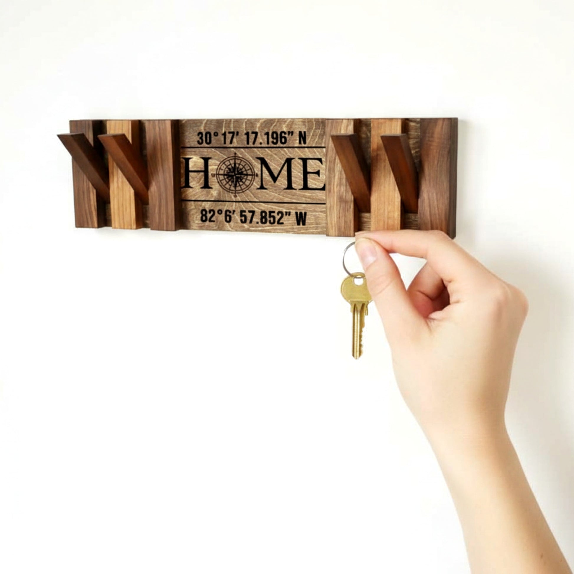 Walnut piano coat rack wall mounted flip down hooks.