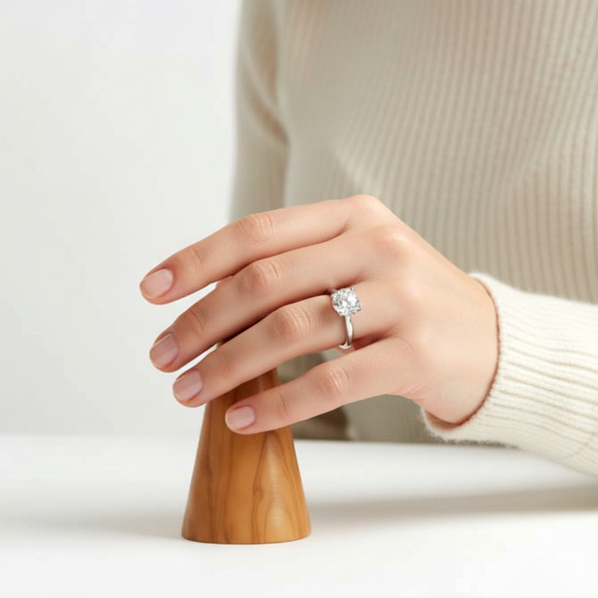 Solid walnut wood ring holder cone for engagement rings.