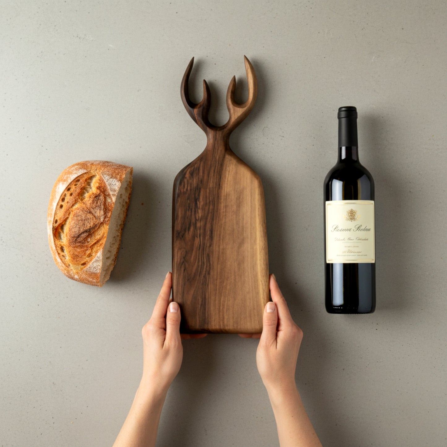 Hand carved walnut wood serving board with antler handle.