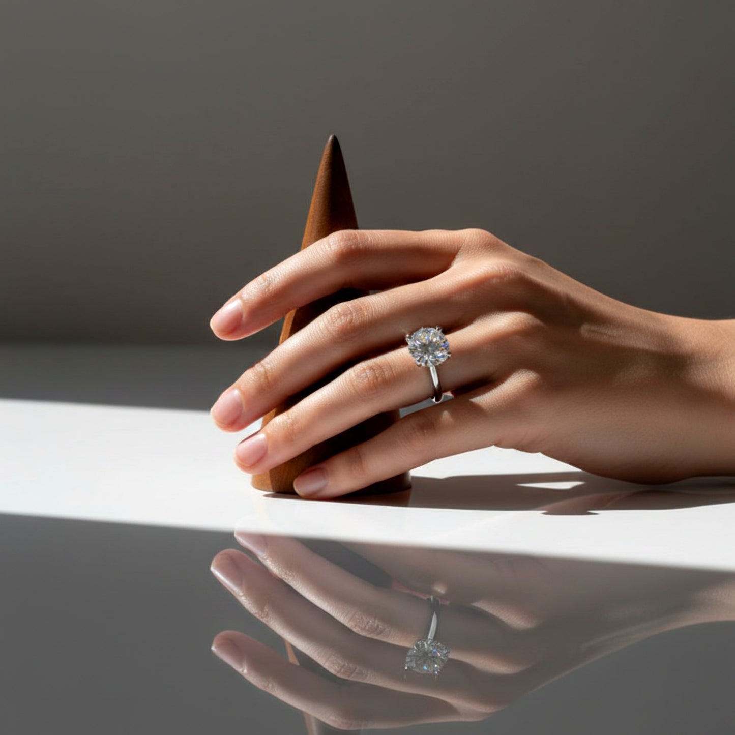 Solid walnut wood ring holder cone for engagement rings.