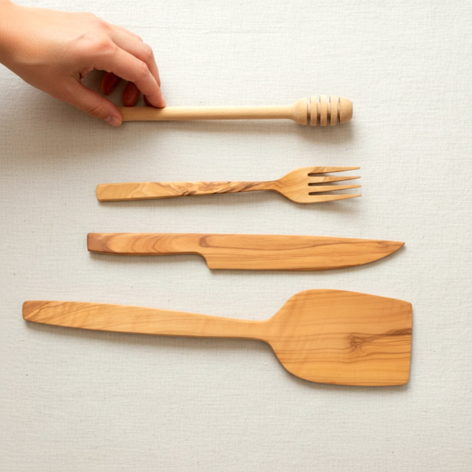 Olive wood kitchen utensil set spatula knife fork honey dipper.