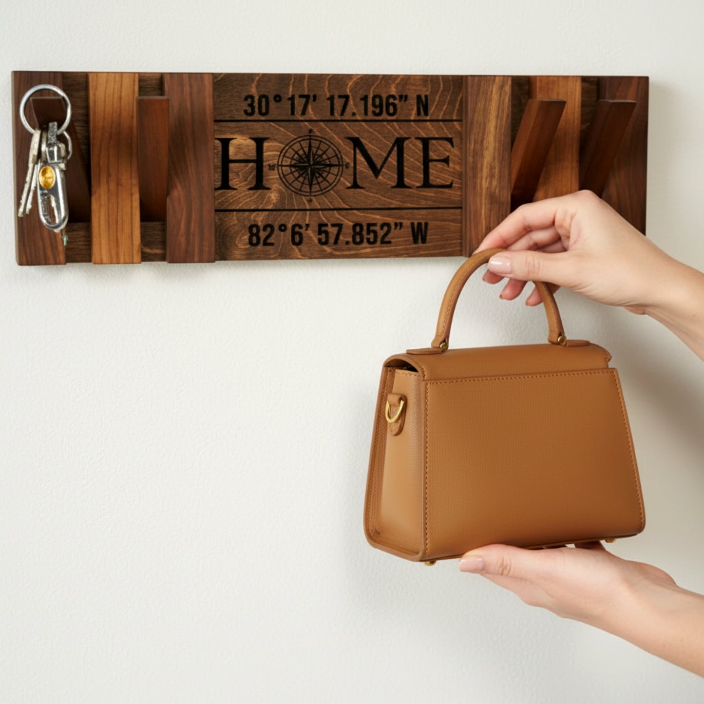 Walnut piano coat rack wall mounted flip down hooks.