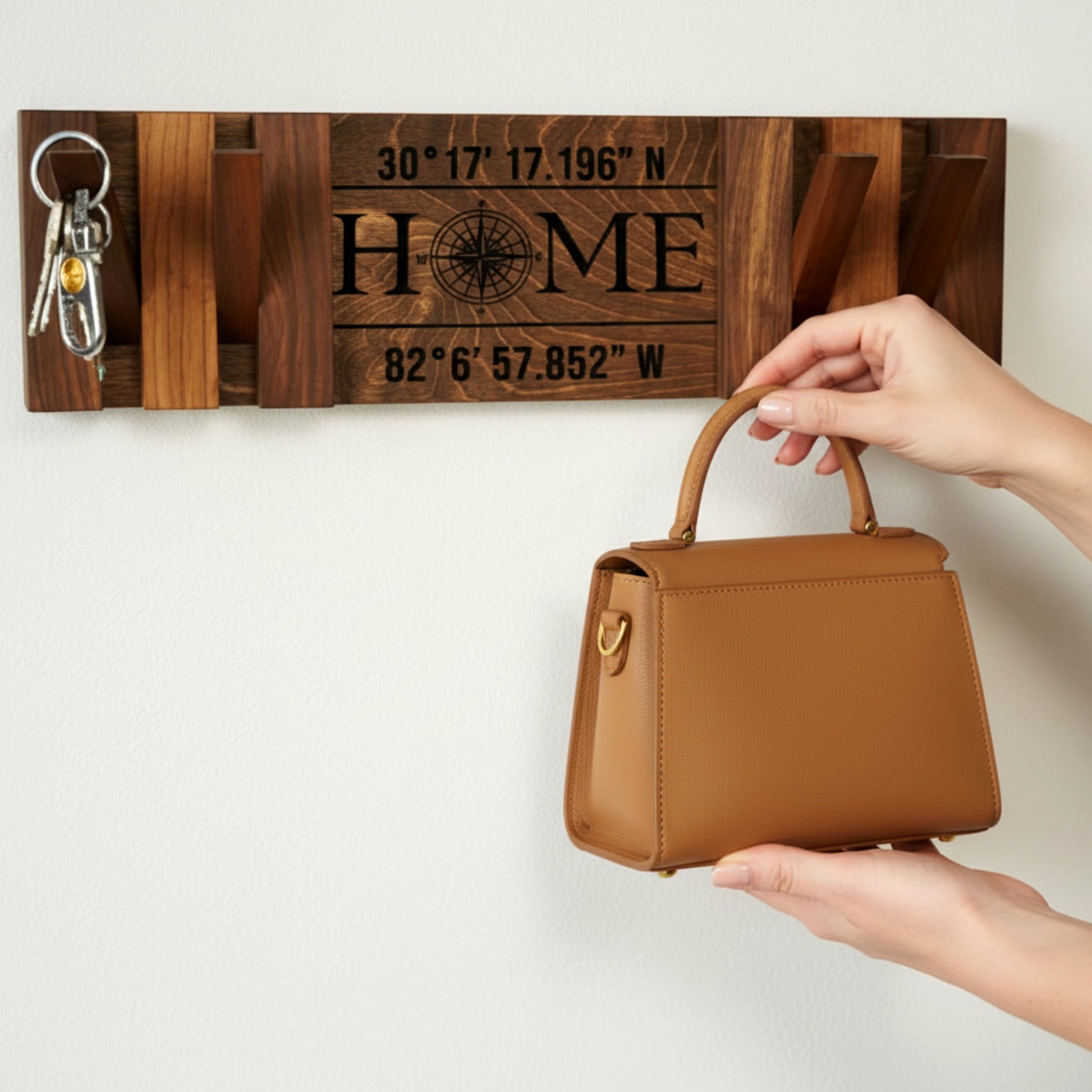 Walnut piano coat rack wall mounted flip down hooks.