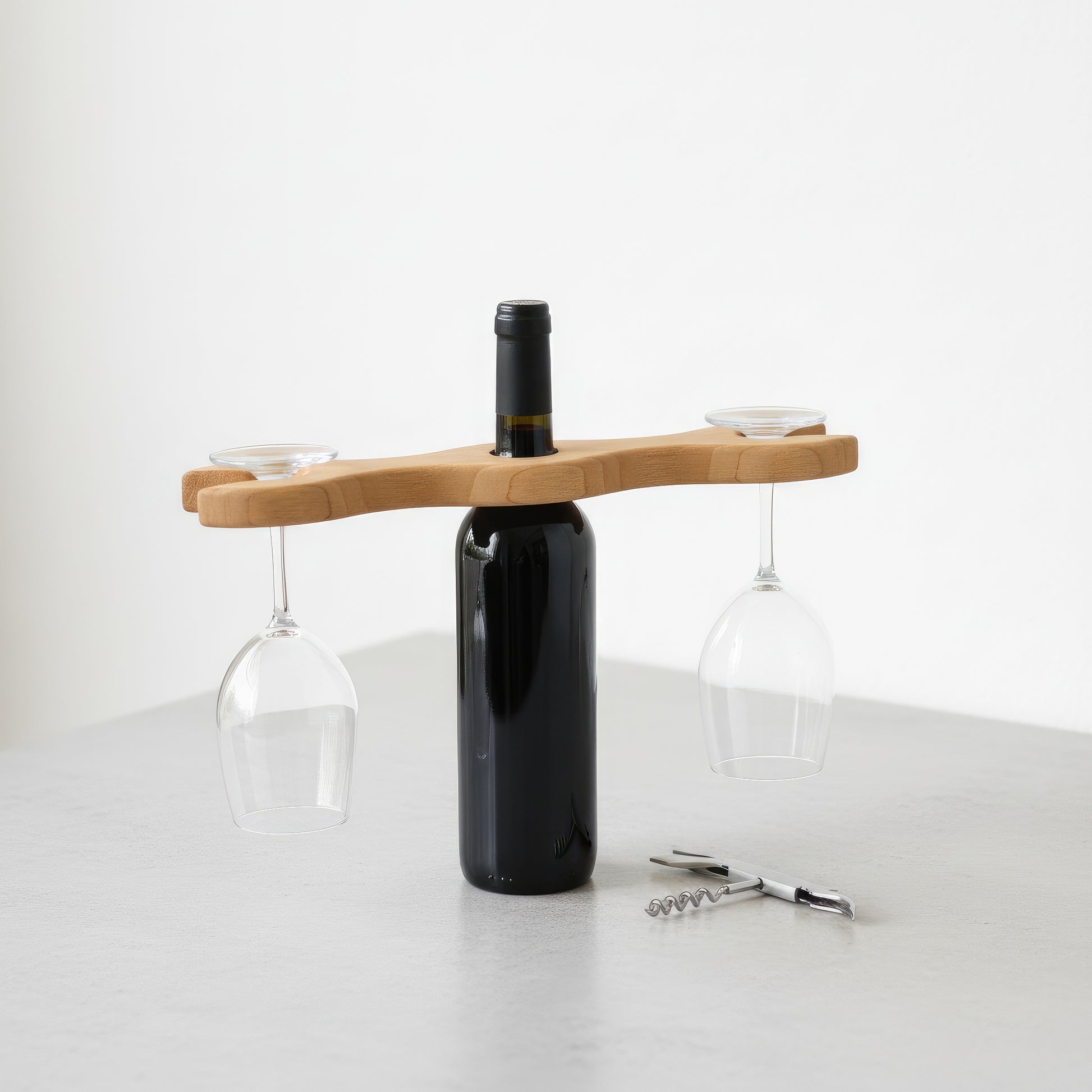 Solid walnut wine bottle and glass holder caddy.
